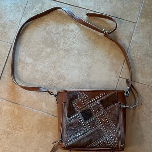 Shyanne Brown and Tan Satchel